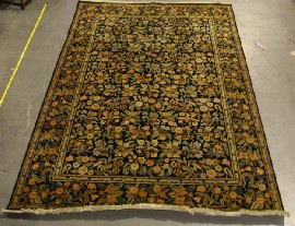 Appraisal: A Contemporary rug with overall pattern of floral motifs cm