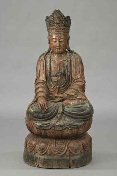 Appraisal: Chinese Ming carved wood Shakyamuni Buddhaseated on a lotus throne