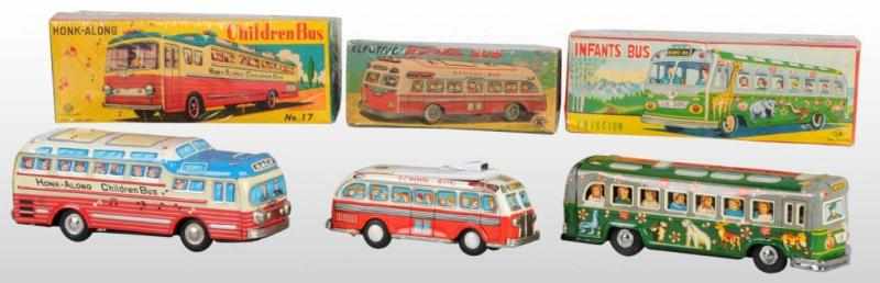 Appraisal: Lot of Tin School Bus Friction Toys Description Japanese Working