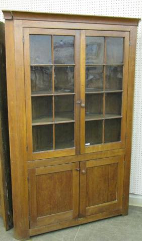 Appraisal: Cherry and poplar pane corner cupboard feet have been cut