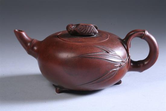 Appraisal: CHINESE YIXING POTTERY TEAPOT Huang Yonglin maker's mark - in