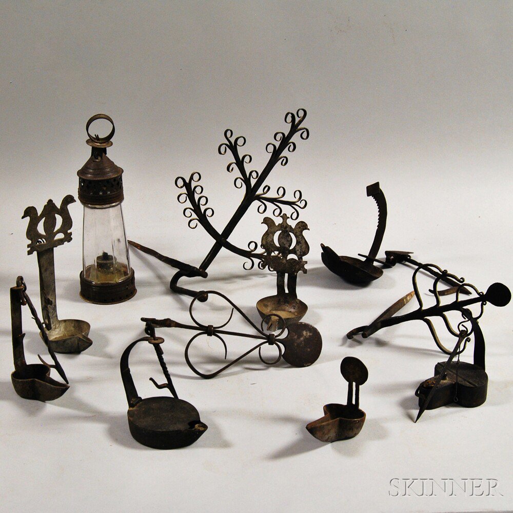 Appraisal: Eleven Mostly Wrought Iron Domestic Items five cruise lamps two