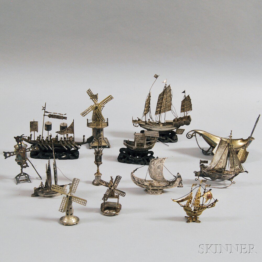 Appraisal: Thirteen Small Figural Mostly Silver Objects primarily boats and windmills