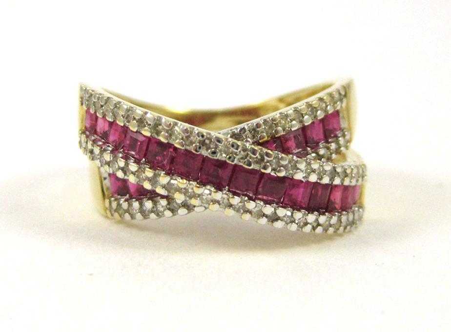 Appraisal: RUBY DIAMOND AND FOURTEEN KARAT GOLD RING set with four