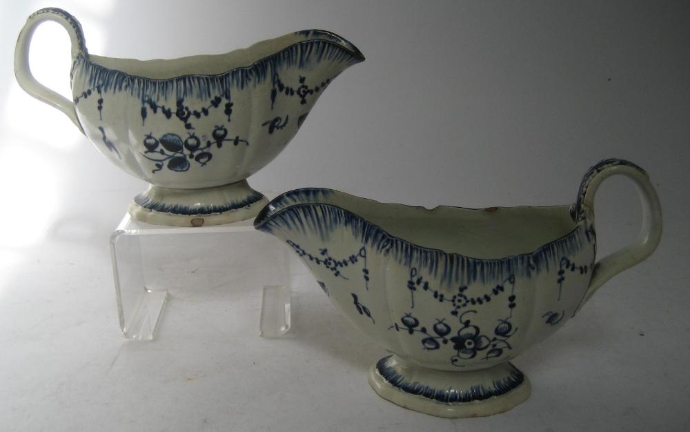 Appraisal: A PAIR OF PEARLWARE SAUCE BOATS early th century with