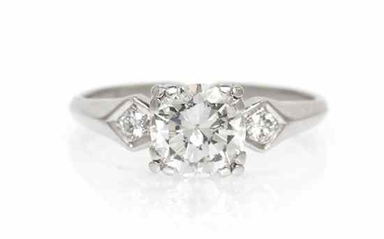 Appraisal: A Platinum and Diamond Ring containing one round brilliant cut