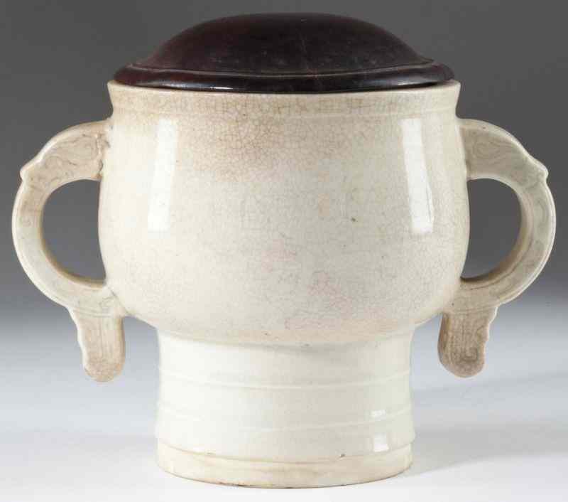 Appraisal: Chinese Double Handled Vesselwhite crackle glaze bulbous body with incised