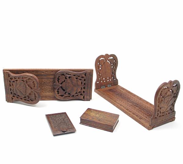 Appraisal: A pair of Southeast Asian carved wood bookrests with two