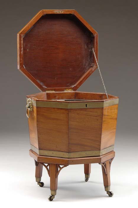 Appraisal: GEORGE III OCTAGONAL MAHOGANY CELLARET Hinged lid opens to reveal