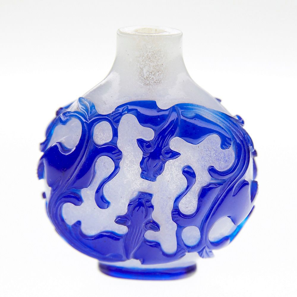 Appraisal: Round Chinese Blue Glass Overlay Snuff Bottle A lovely Chinese