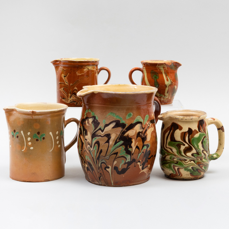 Appraisal: GROUP OF FIVE GLAZED EARTHENWARE PITCHERS PROBABLY AMERICAN Unmarked The