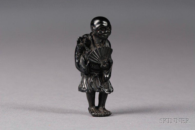 Appraisal: Ebony Netsuke th century a blind monk holding a Buddhist