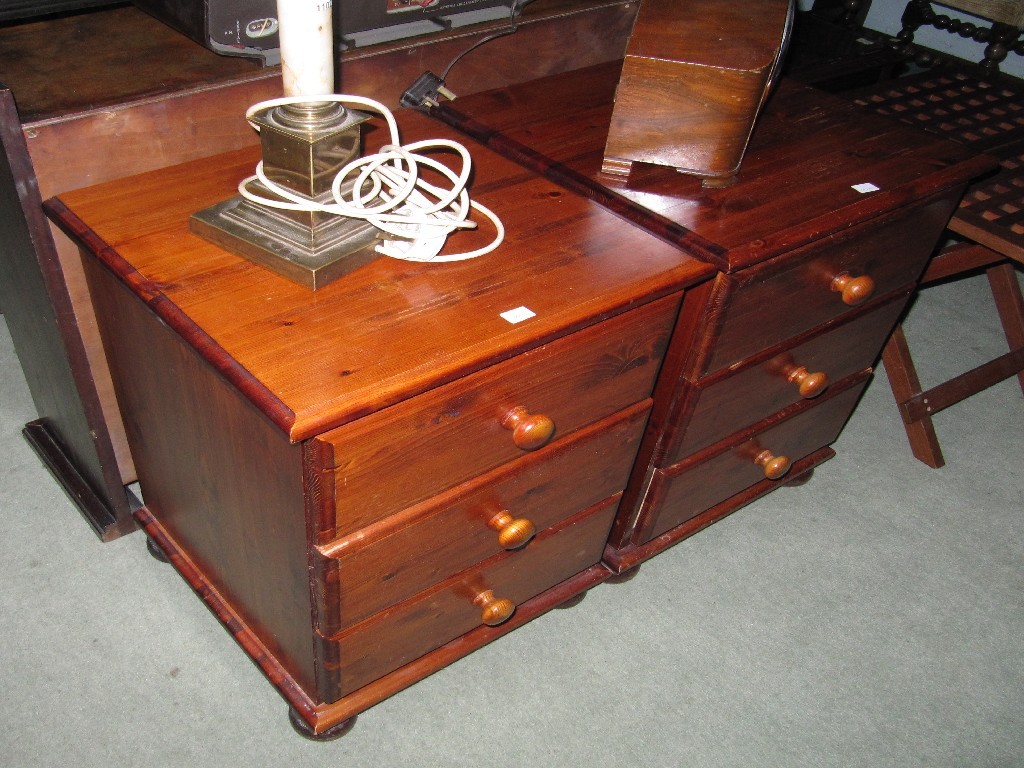 Appraisal: Open bookcase and a pair of pine bedside cabinets