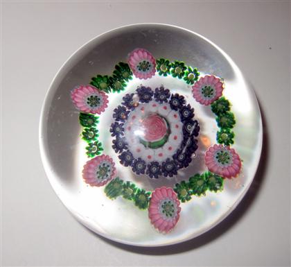 Appraisal: Clichy concentric millefiori paperweight With a central Clichy pink and