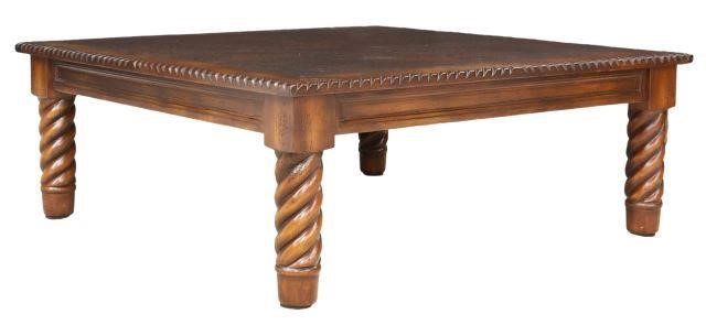 Appraisal: Western style coffee table th c with custom tooled leather