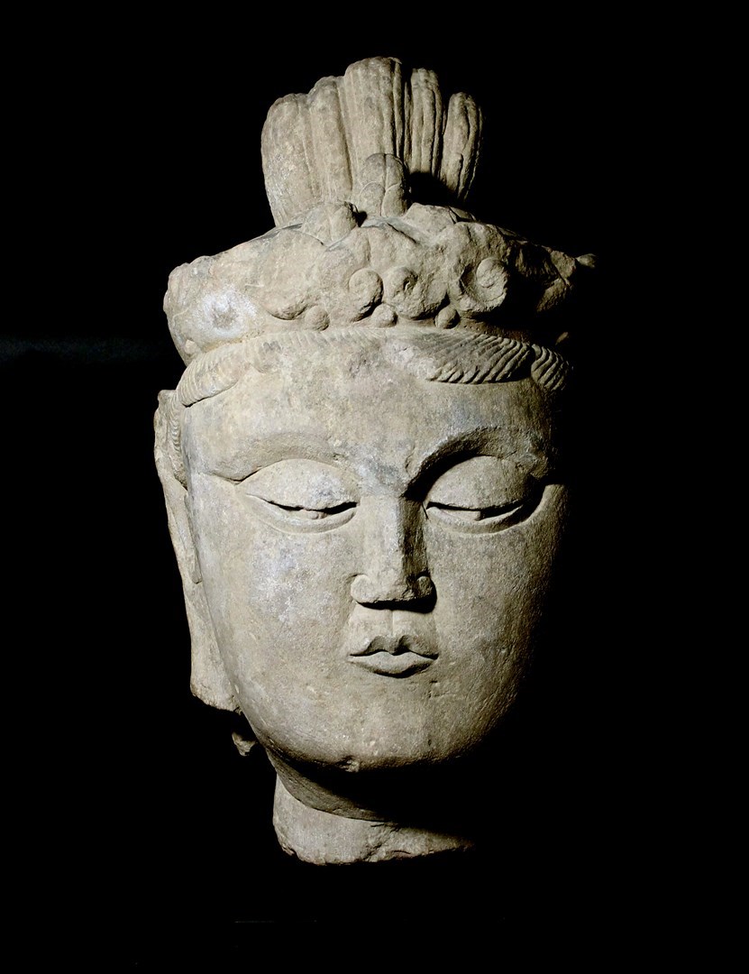 Appraisal: A large carved sandstone head of Buddha cm high possibly