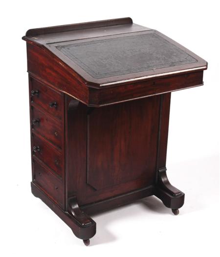 Appraisal: A Victorian mahogany davenport the writing slope with skiver enclosing