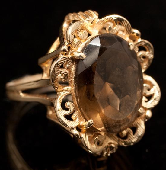 Appraisal: Lady's K yellow gold and smoky topaz cocktail ring topaz