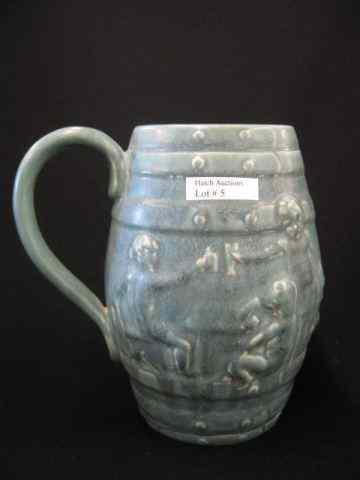 Appraisal: Rookwood Pottery Tankard bas-relief scene with children steins barrel form