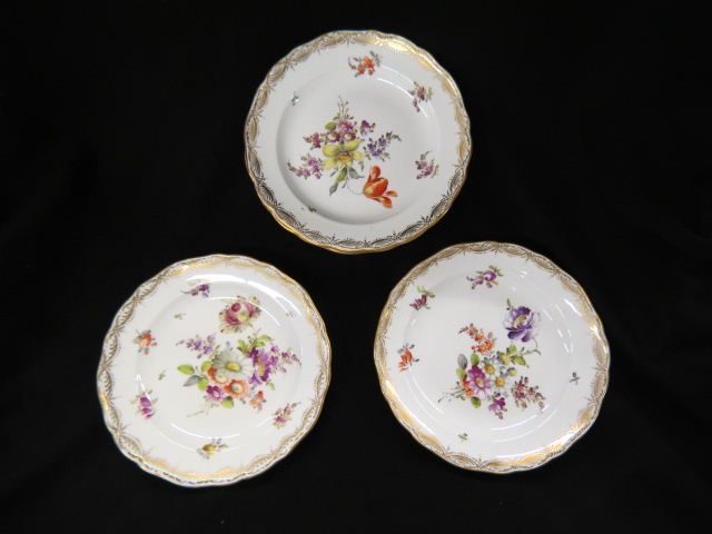 Appraisal: Meissen Porcelain Dessert Plates handpainted florals fine gold work excellent