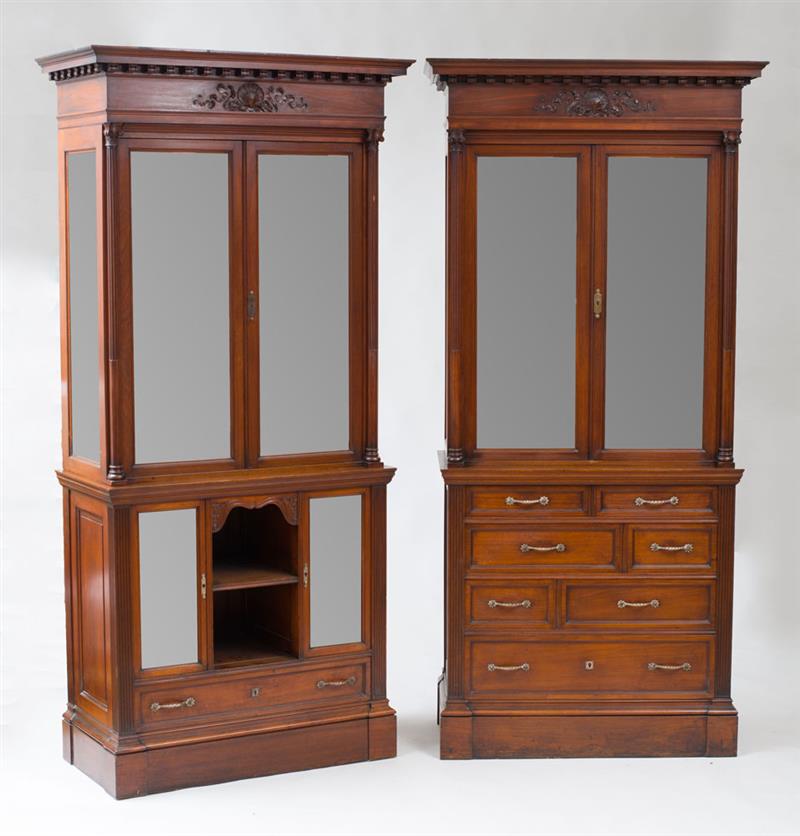 Appraisal: HERTER BROTHERS PAIR OF VITRINE CABINETS Carved mahogany beveled glass