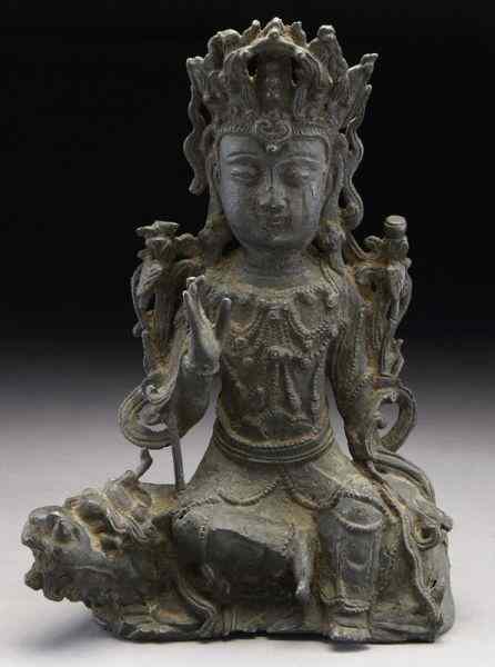 Appraisal: Chinese Ming bronze Guanyin seated on a dragon ''H Circa