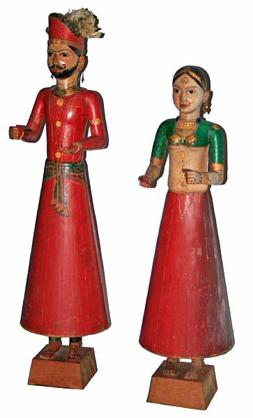 Appraisal: A pair of Indian carved and painted wood figures Possibly