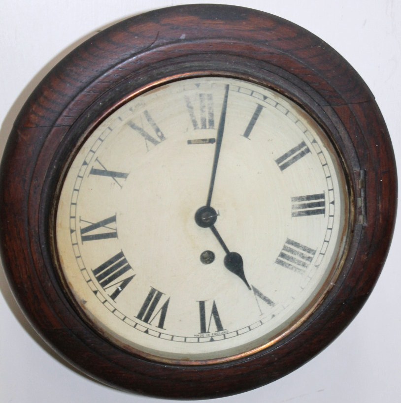 Appraisal: A late thC early thC oak case school clock the