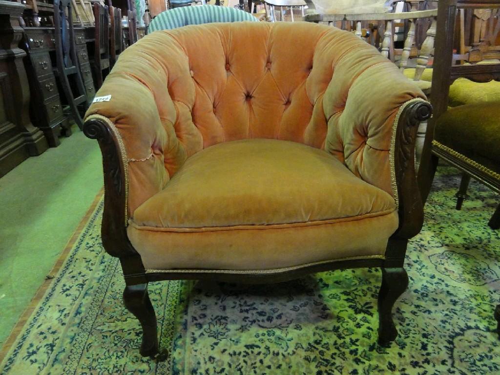 Appraisal: An Edwardian tub chair with upholstered seat and button back