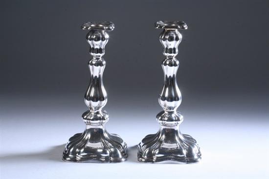 Appraisal: PAIR GERMAN STERLING SILVER CANDLESTICKS Gayer Krauss Square bases supporting