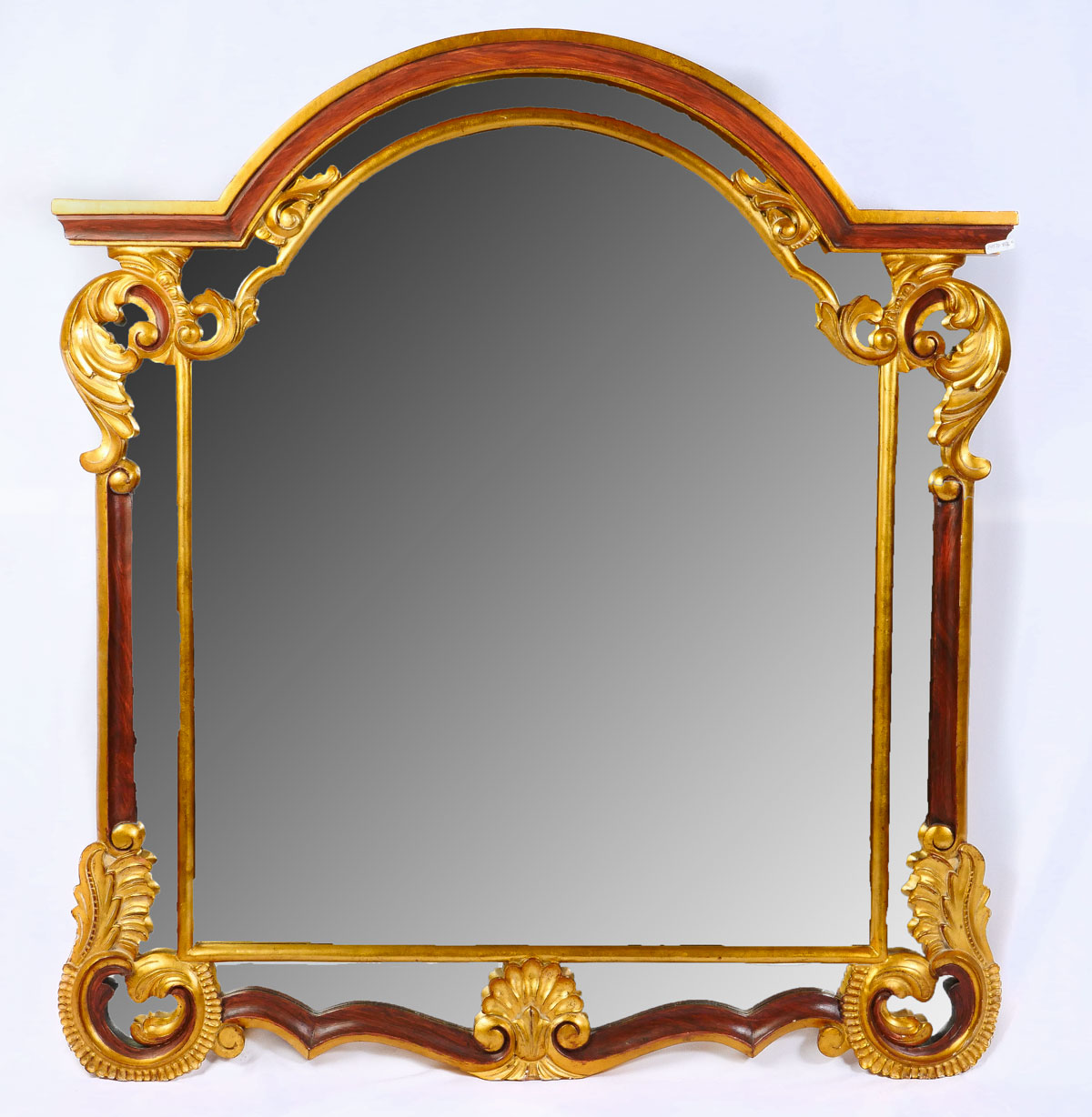 Appraisal: GILT DAUPHINE HARRISON GIL MIRROR Hand carved arch form mirror