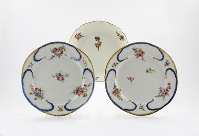 Appraisal: Three S vres plates all painted with scattered flower sprays