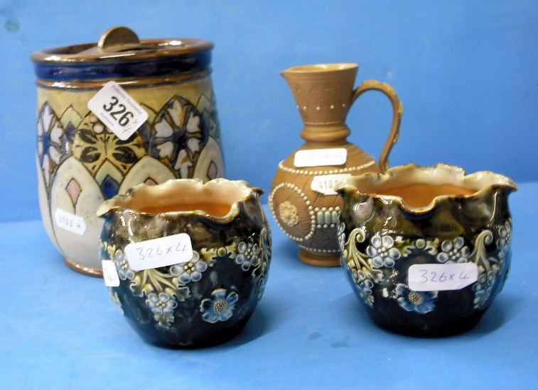 Appraisal: Royal Doulton Lambeth pair vases decorated with flowers chipped Silicon