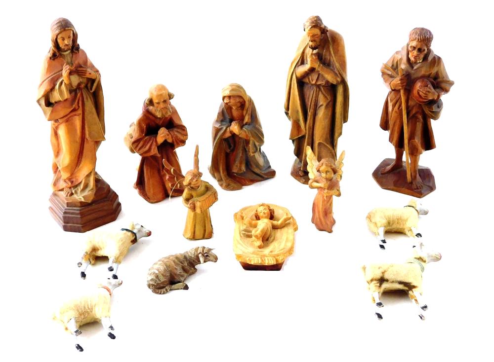 Appraisal: Thirteen vintage figurines details include six Italian Anri carved wood