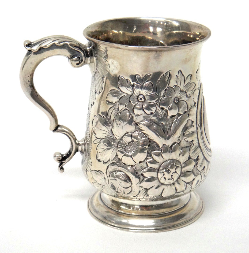 Appraisal: A George III silver mug of baluster form with later