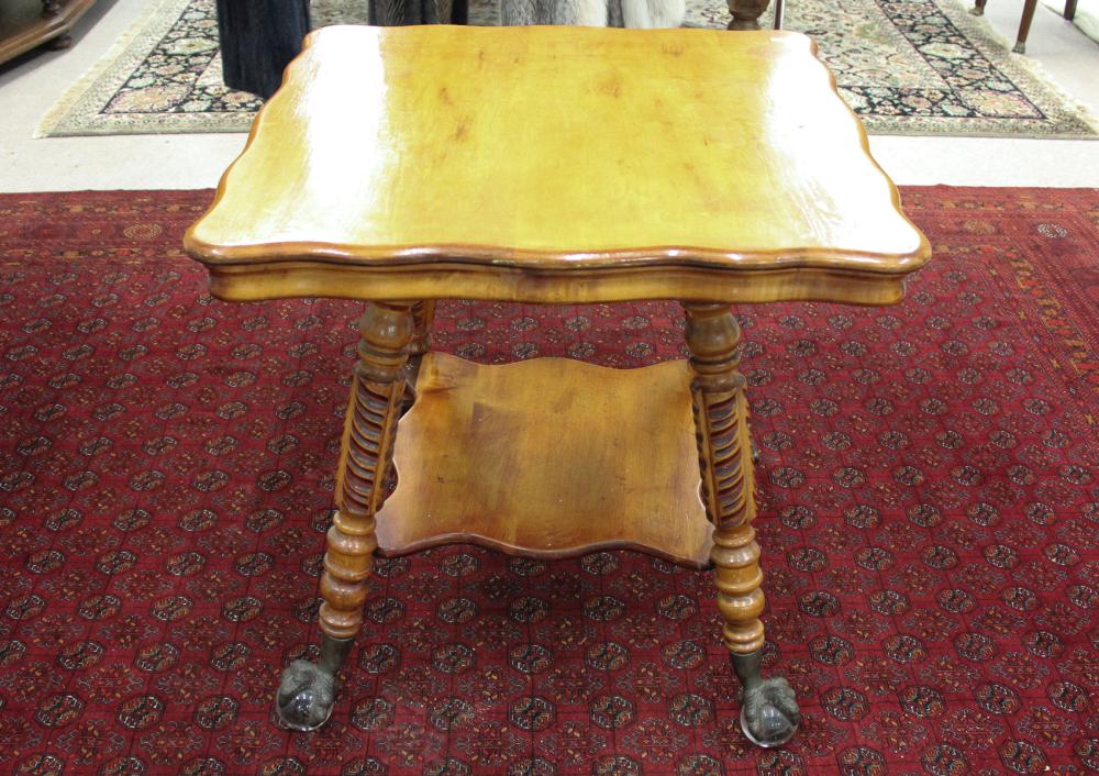 Appraisal: VICTORIAN YELLOW MAPLE LAMP TABLE American late th century having