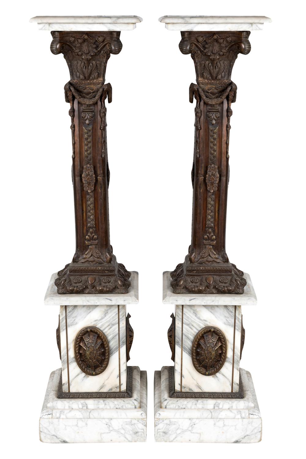 Appraisal: PAIR OF MARBLE GILT METAL PEDESTALSwith square tops on columnar