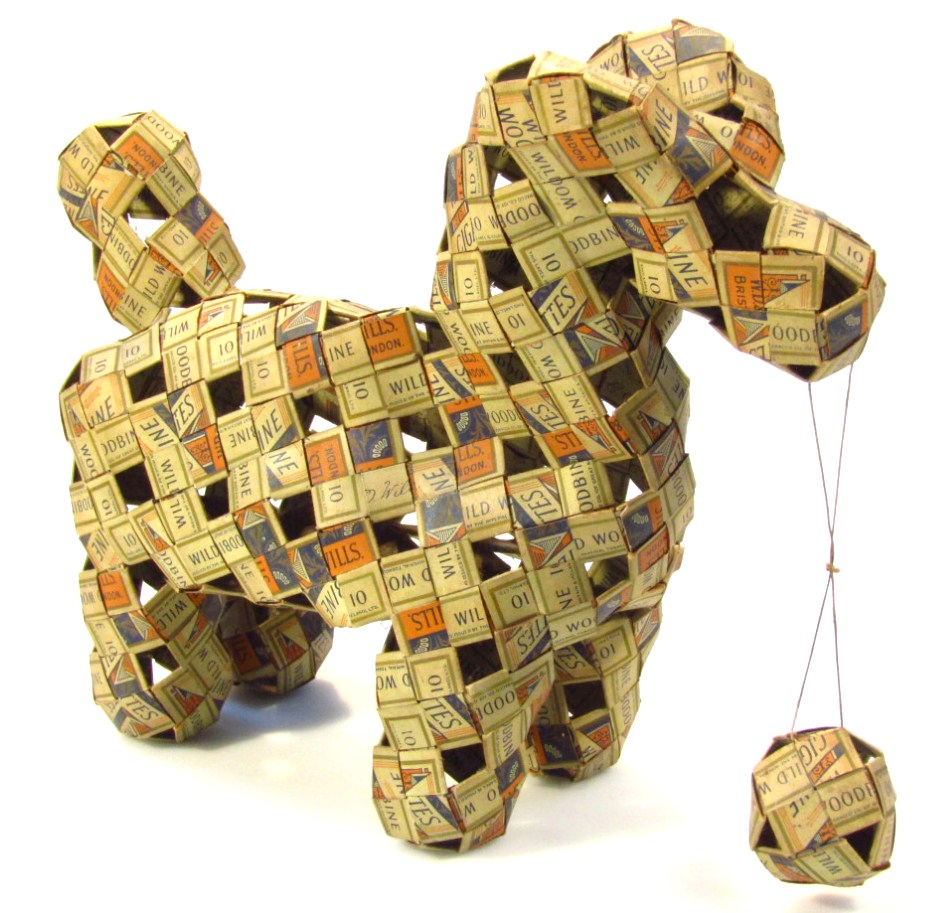 Appraisal: A Folk Art model of a dog made from Woodbine