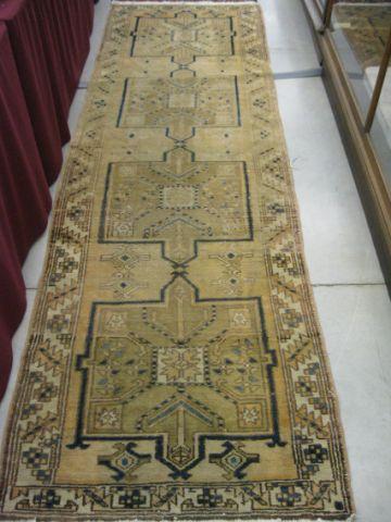 Appraisal: Heriz Persian Handmade Runner four geometric medallions tans browns with