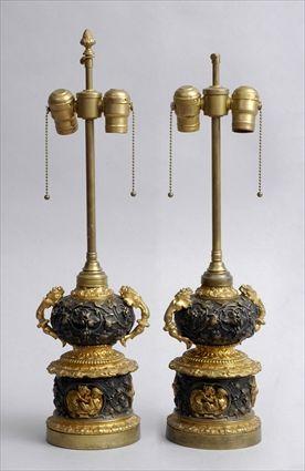 Appraisal: PAIR OF RENAISSANCE-STYLE BRONZE-PATINATED METAL AND GILT-METAL URNS MOUNTED AS