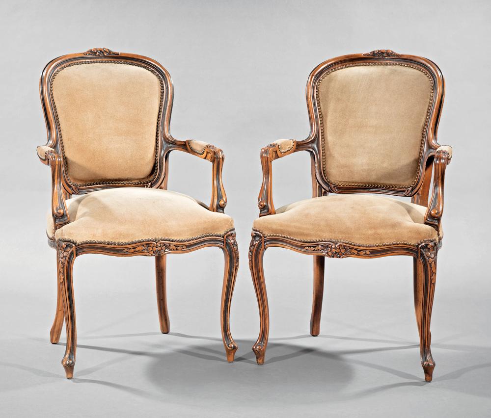 Appraisal: Pair of Louis XV-Style Carved Walnut Fauteuils th c molded