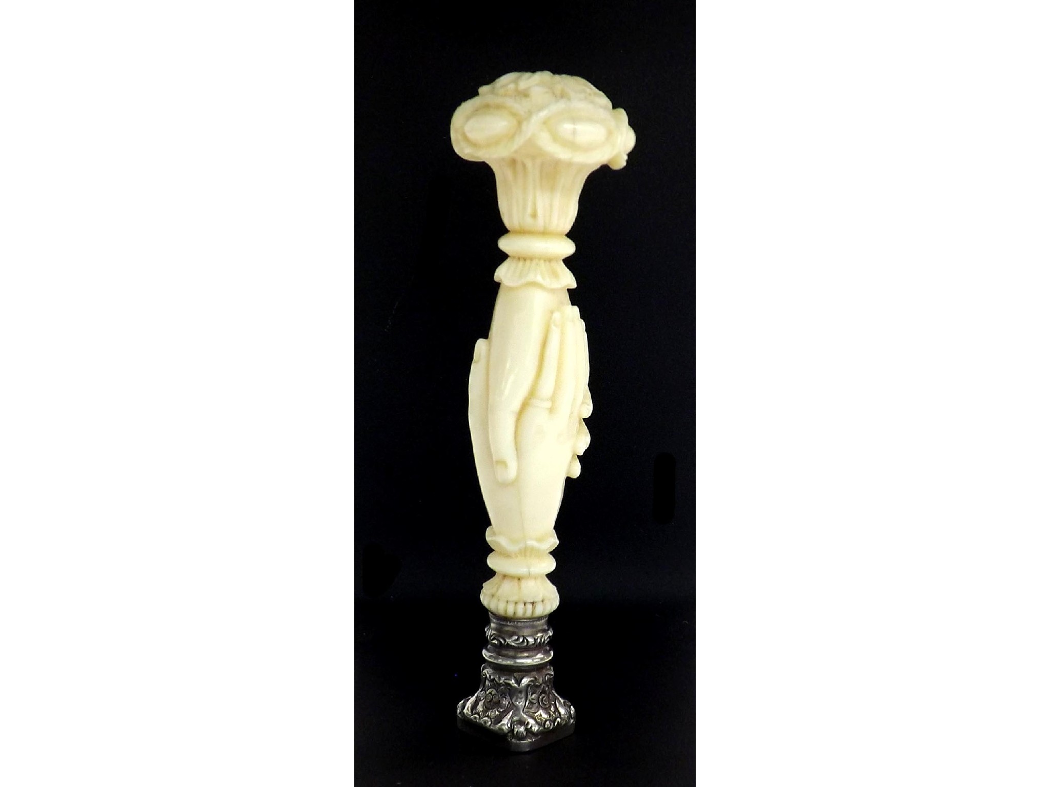 Appraisal: th century carved ivory desk seal modelled with linked hands