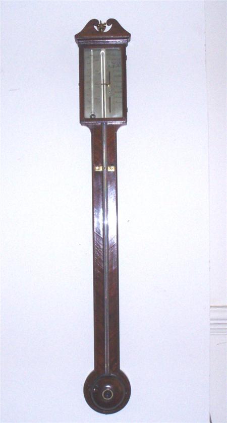 Appraisal: A George III mahogany and chequer banded stick barometer By