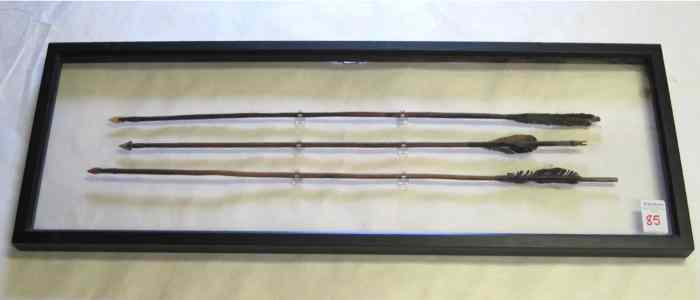 Appraisal: FRAME OF THREE NATIVE AMERICAN ARROWS all have hand tied