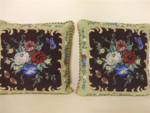 Appraisal: PAIR OF NEEDLEPOINT PILLOWS Stitched in the Victorian style with