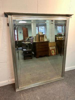 Appraisal: A large modern overmantel mirror with silver painted frame and