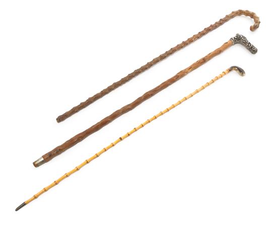 Appraisal: Sale Lot A Group of Three Canes comprising a chased