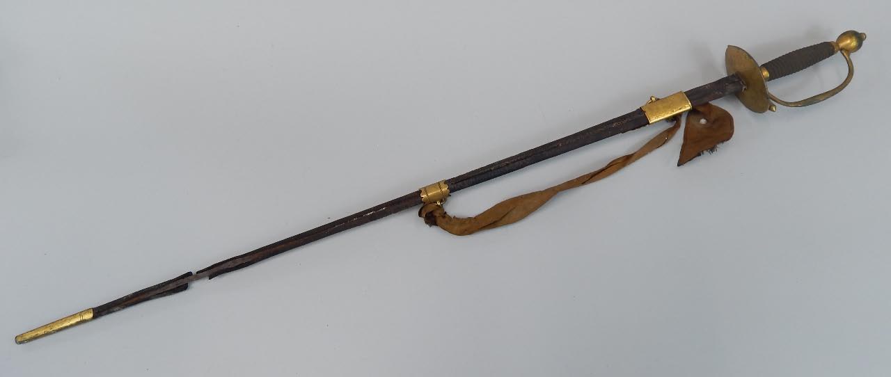 Appraisal: A brass hilted dress sword with leather scabbard AF total