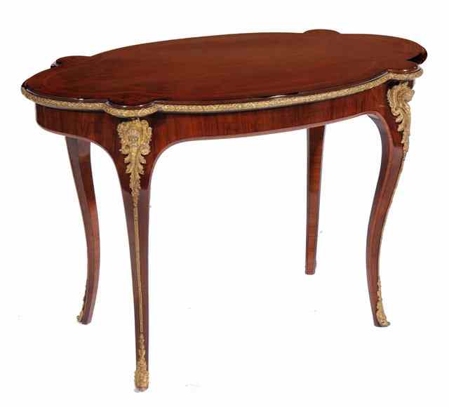 Appraisal: A LOUIS XV STYLE KINGWOOD CENTRE TABLE with ormolu mounts