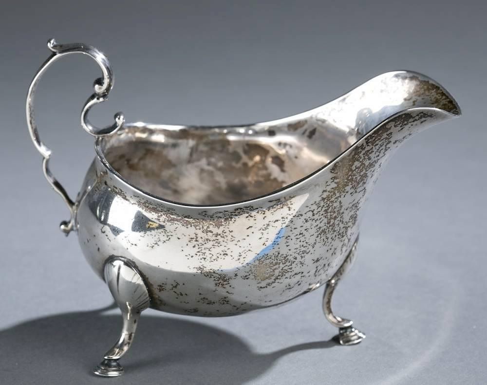 Appraisal: Irish Sterling sauceboat c An Irish Sterling sauce boat c